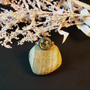 Front view of Sunlit Radiance sterling silver Lemon Quartz ring with radiant golden gemstone.