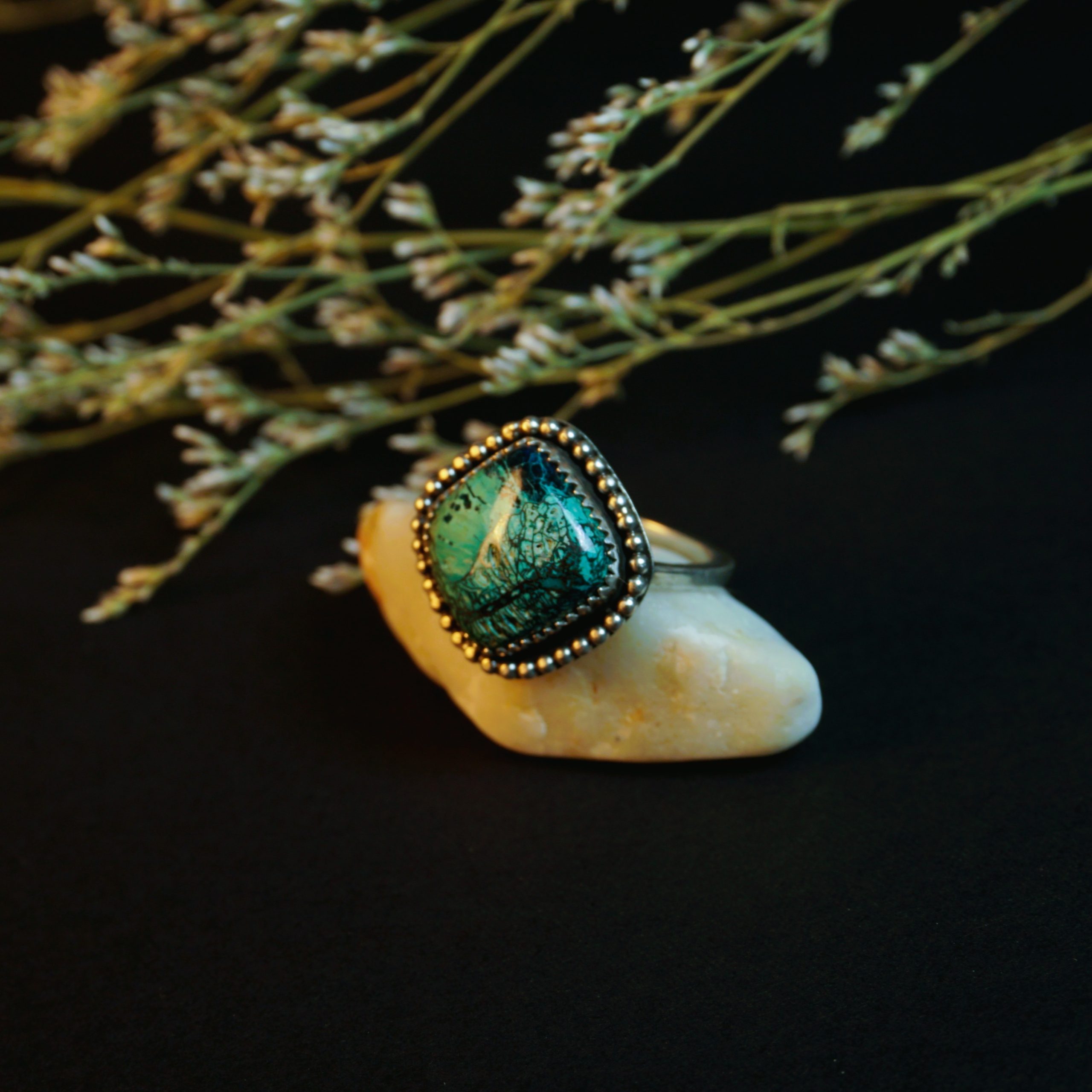 Shattuckite sterling silver ring left side view showing natural stone patterns