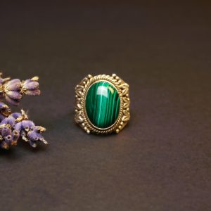 malachite silver ring front view in sterling silver studio background