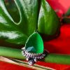 Close-up of Green Monalisa sterling silver ring with rose-cut green gemstone, handcrafted from recycled sterling silver