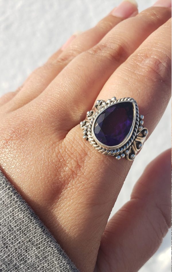 Genuine amethyst ring set in sterling silver with a .925 stamp, featuring a rich purple hue