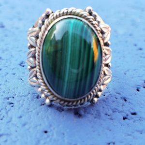 Handmade sterling silver Malachite ring with bold green swirling patterns and rich character