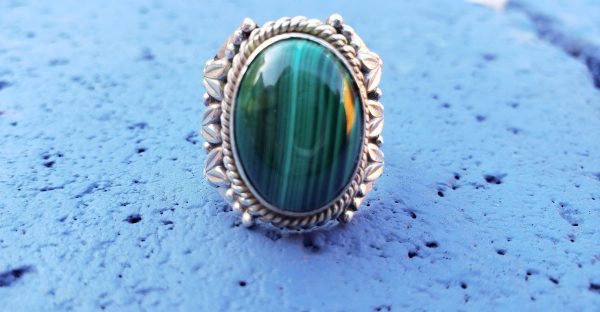 Handmade sterling silver Malachite ring with bold green swirling patterns and rich character